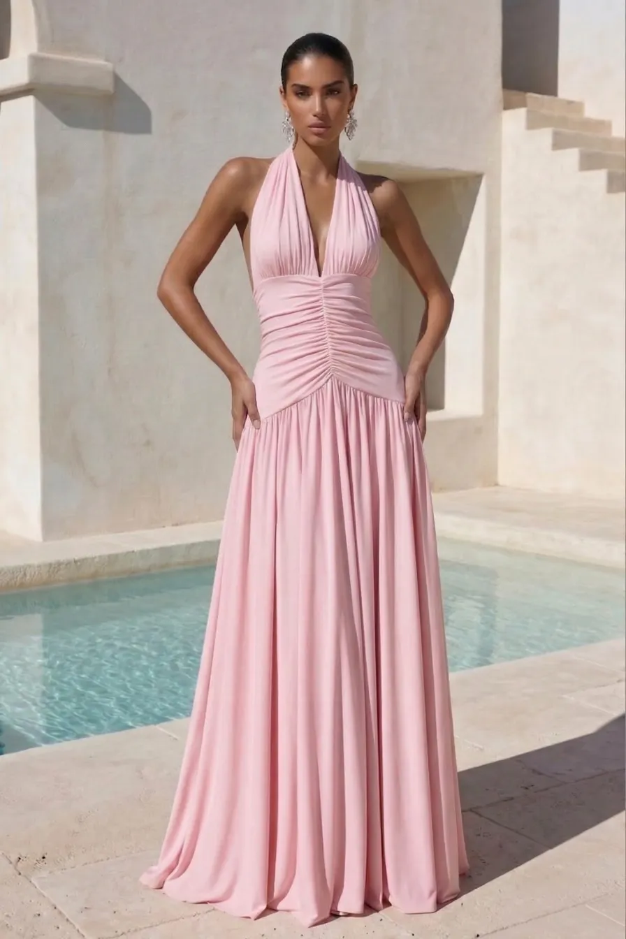 Light pink spring wedding guest dress, sleeveless fitted bodice with floor-length pleated skirt, accessorized with silver statement cuff bracelet and hoop earrings for elegant formal style